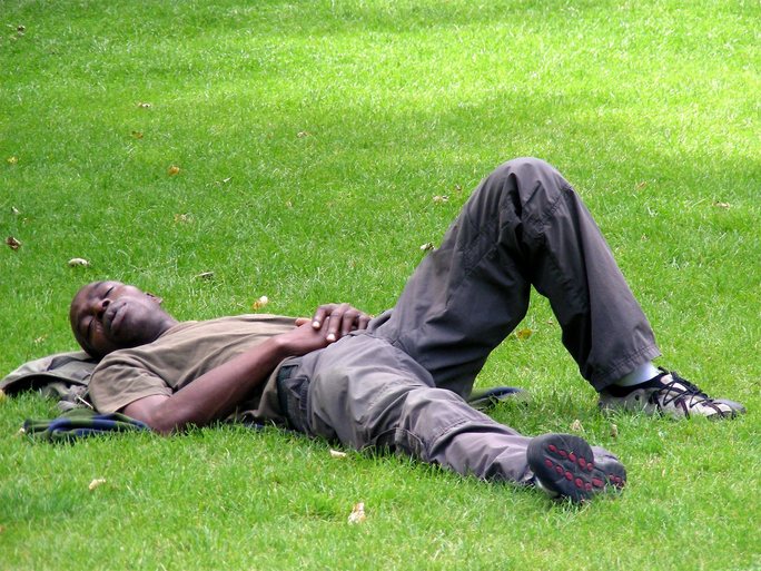 SANCTUARY self-care lying on grass