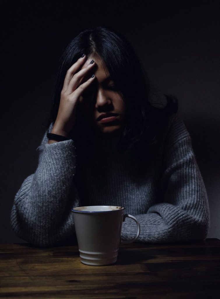 Worry-woman with mug