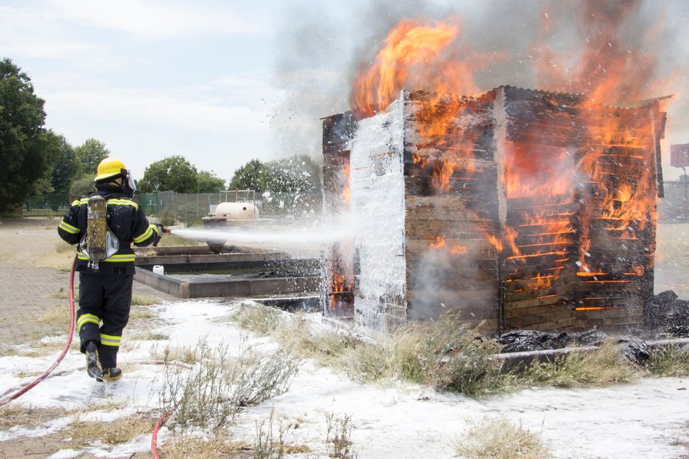 Burning Shack and Fireman