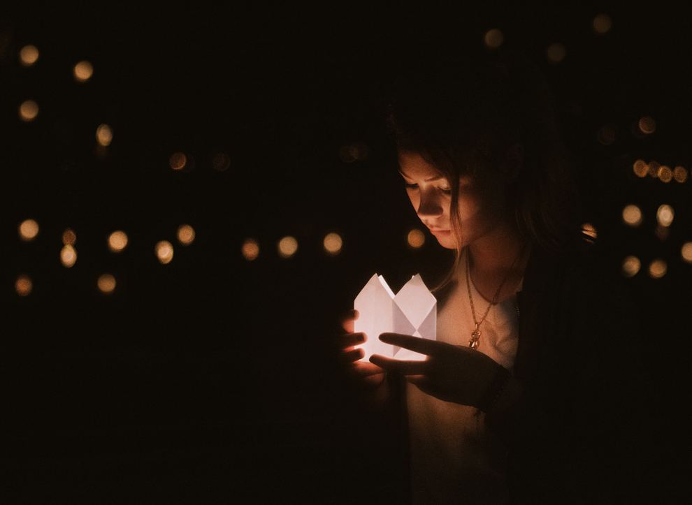 Woman looking at Lantern