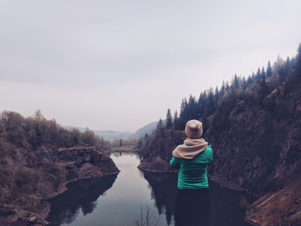 woman looking at river-canyon