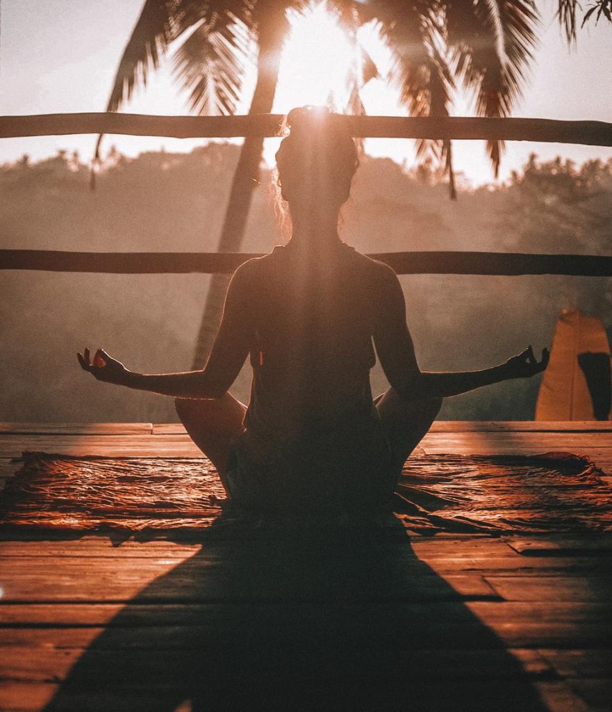 yoga sunset from behind