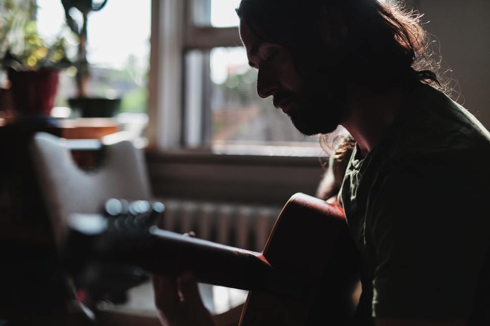 man playing guitar