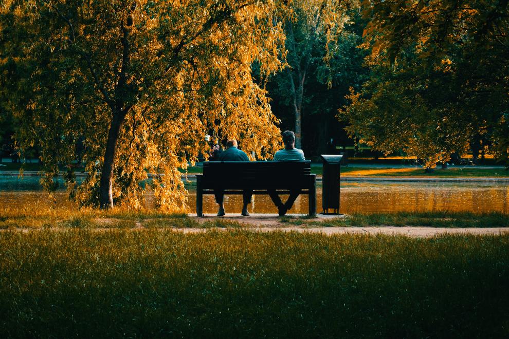 men on park bench