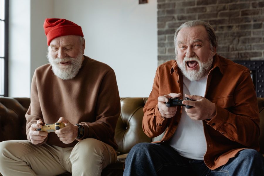 older men playing video game