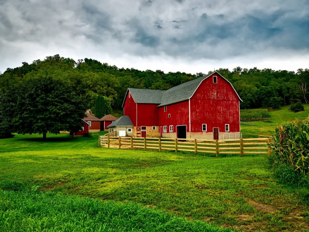 red barn with fence